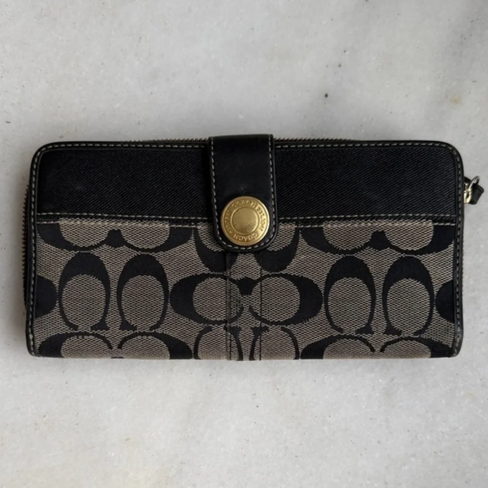 Coach Legacy Signature C jacquard and leather wallet.